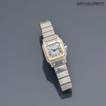 null CARTIER Santos PM 1980

Ladies' wristwatch in gold and steel, ivory dial with...