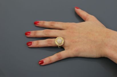 null Dome ring in yellow gold 750°/°° paved with brilliant-cut diamonds set in grains.

TDD:...