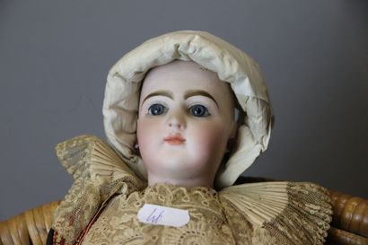 null Folkloric type fashion doll, with bisque head and bust, made by PF JUMEAU, closed...