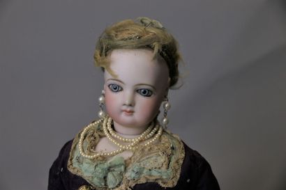 null 
Fashion doll of the Parisienne type, with head and bust in bisque, made by...