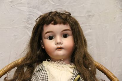 null German doll, with bisque head, open mouth, marked "GK 133-32" brown fixed eyes,...