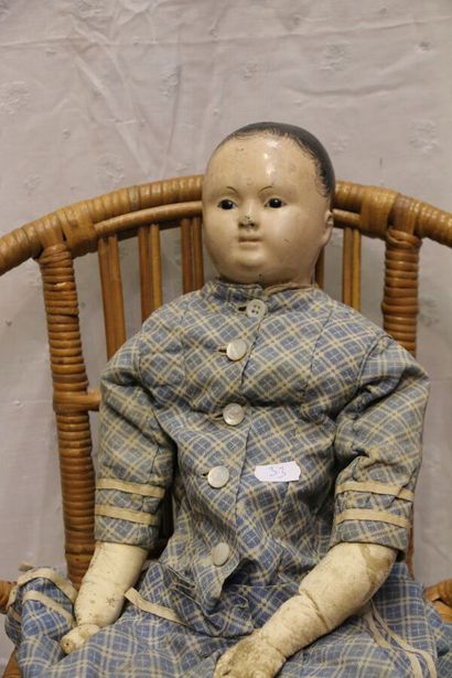 null German doll, 19th century, with papier-mâché bust head, closed mouth, brown...