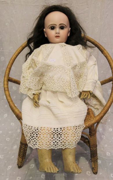 null French doll, with bisque head, closed mouth, unmarked, size 12, brown fixed...