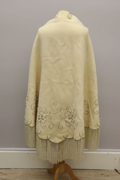 null Woolen cloak embroidered with pearls and sequins decorated with floral scrolls....
