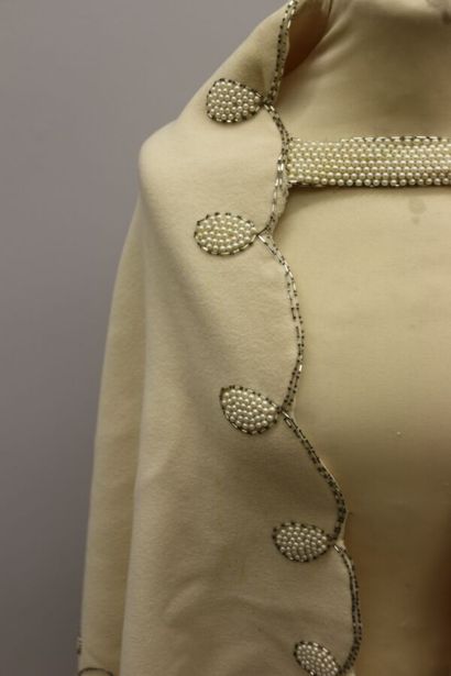 null Woolen cloak embroidered with pearls and sequins decorated with floral scrolls....