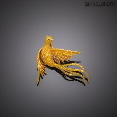 null Broche oiseau de paradis en or jaune 750°/°° richement ciselé, l'oeil orné d'une...