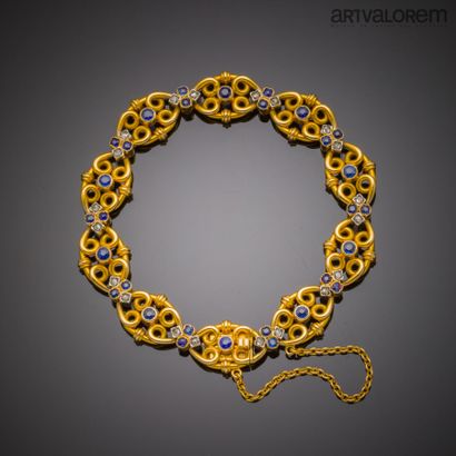 null Yellow gold bracelet 750°/°° with fancy links decorated with sapphires and diamonds...