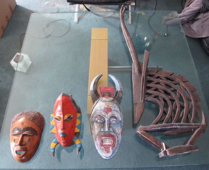null AFRICA

Three carved and polychrome wooden masks. 

Joined : CIWARA, Crest representing...