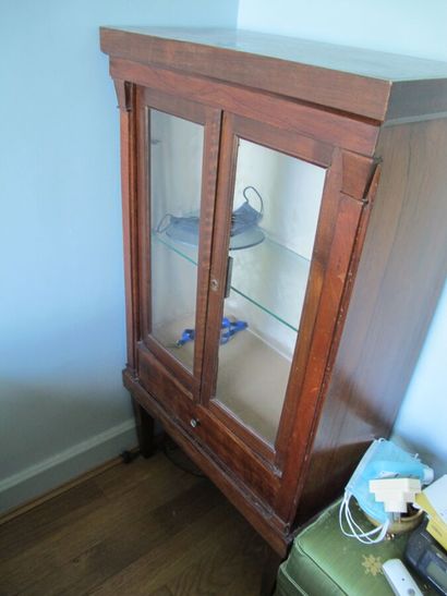 null Mahogany veneered display cabinet, opening to two glass doors and a drawer,...