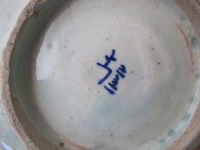 null TURKEY, XIXth century. 

Three enamelled earthenware plates with blue decoration....