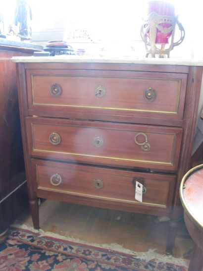 null Chest of drawers in wood veneer, fluted uprights. opening with three drawers,...