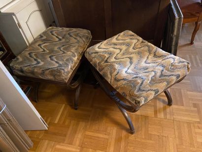 null Pair of stools in natural wood, base carved with ribbons and connected by a...