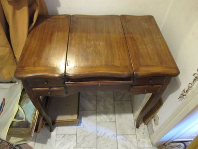 null Dressing table in natural wood opening with two drawers and a shelf in the belt,...