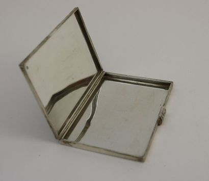 null Silver cigarette case with chased flutes.

Master goldsmith Kirby Beard, Minerve...
