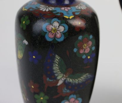 null CHINA, 20th century, 

Three copper vases with cloisonné enamel decoration of...