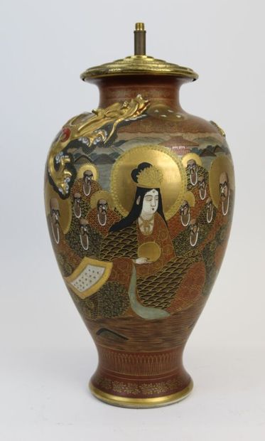 null JAPAN, Satsuma, 20th century 

Porcelain baluster vase with enameled and gold...