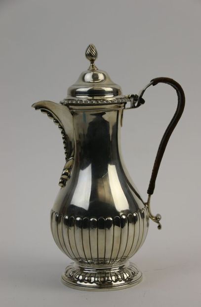 null Silver coffee pot, handle covered with leather, decorated with gadroons and...