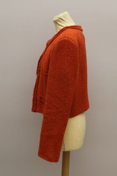 null AMELIE & AMELIE

Orange wool blend suit style jacket, two false pockets, closes...