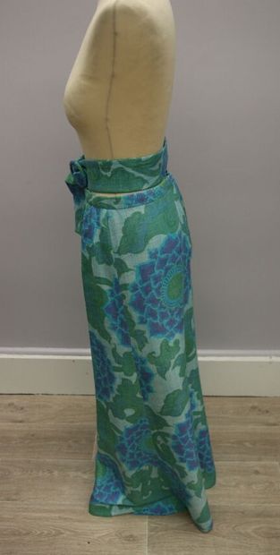 null CHOISY 

Long vintage skirt, flared with blue and green flowers, closing with...