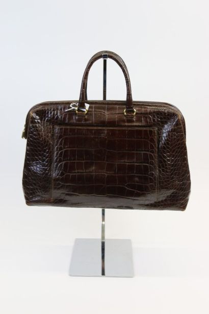 null FURLA

Handbag in brown crocodile style, two handles, closing by a zip, inside...