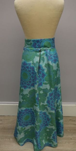null CHOISY 

Long vintage skirt, flared with blue and green flowers, closing with...