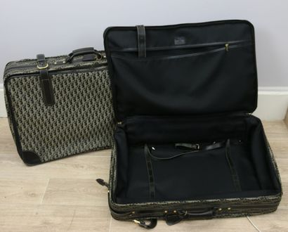 null 
CHRISTIAN DIOR 

Set of two semi-rigid suitcases with double handles in cream...