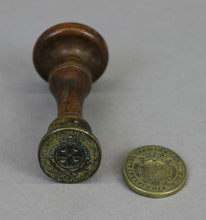 null Two bronze wax seals, the wooden handle on one, including : - Seal of the Chateleine...