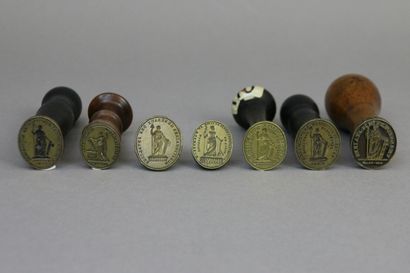 null Seven wax seals in bronze, the handle in boxwood on five, of which: - Military...