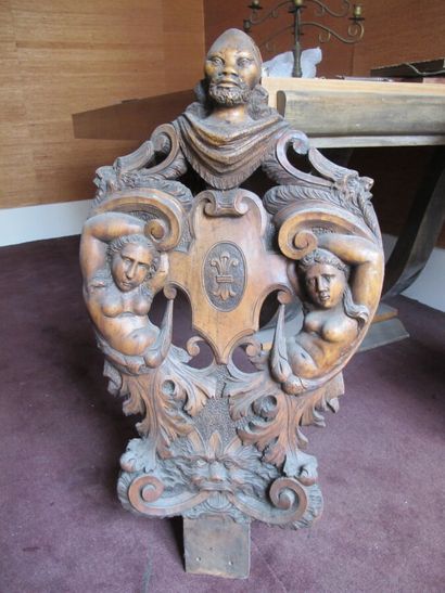 null Decorative element in walnut carved and openwork of a head of Moor and two mermaids...