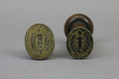 null Two wax seals in bronze, the handle in boxwood on the one, including : - Department...