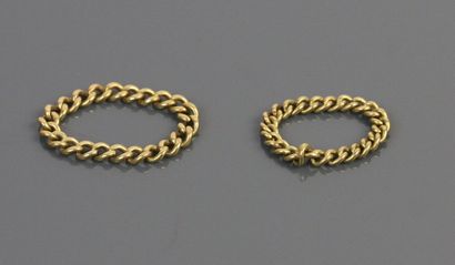 null Three rings in yellow gold 750°/°° in mesh. 

Weight : 6,9 g