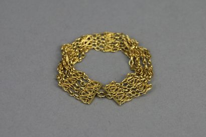 null Bracelet composed of five rows of fancy chain in yellow gold 750°/°°, lobster...