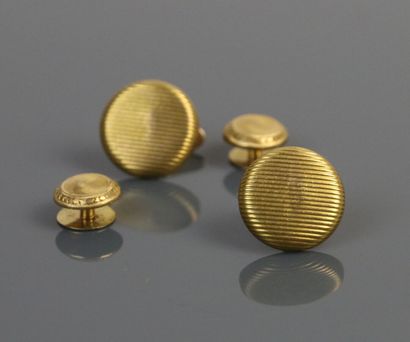 Two pairs of circular breastplate buttons...