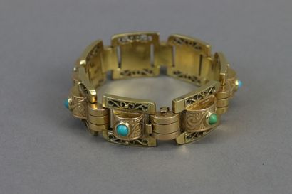 null Tank bracelet in yellow gold 750°/°° composed of engraved and openwork links...