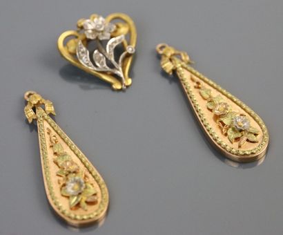 null Two brooches and a medallion in yellow and pink gold 750°/°°, with openwork...