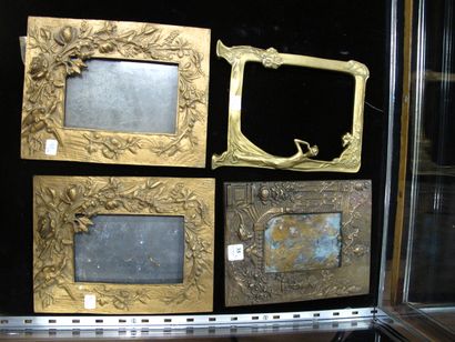 Four gilt metal, brass and bronze photo frames...