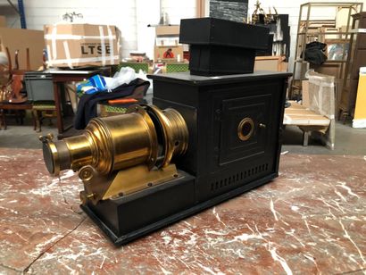 Magic lantern in black lacquered metal and...
