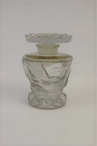 null Lanselle - "Valenciennes" - (1945)
Bottle in colorless pressed glass of cylindrical...