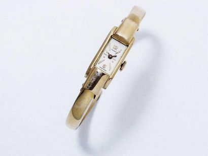 LIDHER Montre bracelet jonc ouvrant de dame, cadran rectangulaire ivoire avec chiffres...