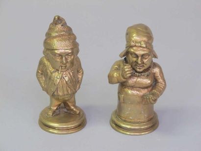 null Deux encriers en bronze doré figurant une femme et un homme. Ht: 12 cm