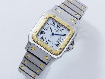 CARTIER "SANTOS" Montre bracelet d'homme en or 18 K et acier, cadran blanc avec chiffres...