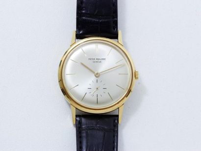 PATEK PHILIPPE Réf 3416/1 Montre bracelet d'homme en or 18 K, cadran champagne rayonnant...