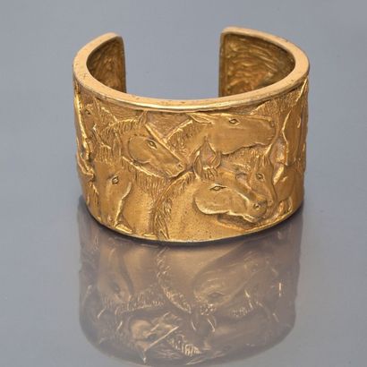 null Jaded - (1991 - Etats Unis) Elégant bracelet manchette en bronze doré ciselé...