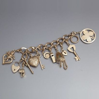 null Monet - (années 1980 - Etats Unis) Bracelet gourmette en métal argenté à 9 maillons...