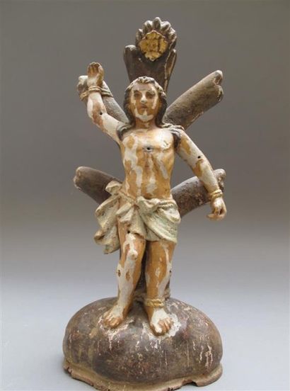 null Saint Sébastien en bois sculpté polychrome. H. : 36 cm. 