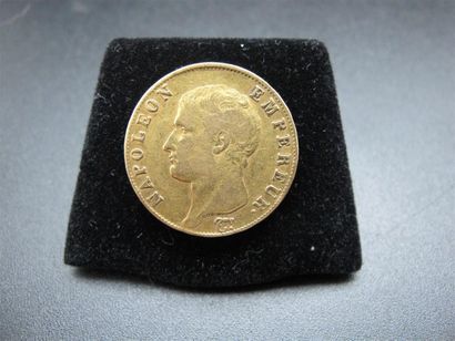 null Napoléon 40 Francs or, tête nue, datée 1806 U. Poids : 12,8 g.