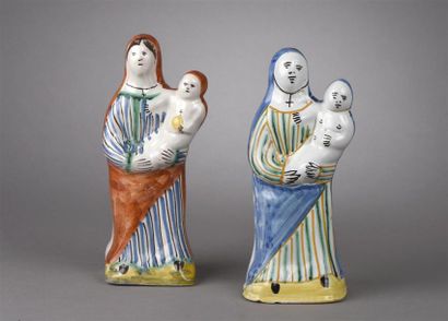 null CENTRE. Deux statuettes en faïence représentant chacune une Vierge à l'Enfant...