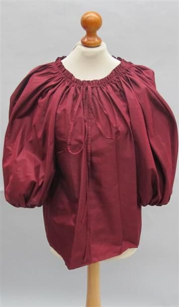 null YSL Rive Gauche. Blouse en soie bordeaux, manches bouffantes 3/4 et col bateau...