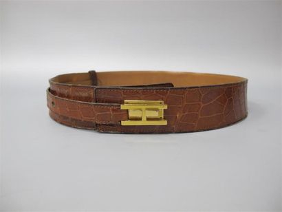 null HERMÈS Paris. Ceinture en Crocodile Porosus marron clair, fermeture à patte...