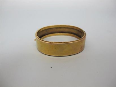 null Bracelet rigide ouvrant en deux parties en or jaune (585°/°°) (14k). Poids :...